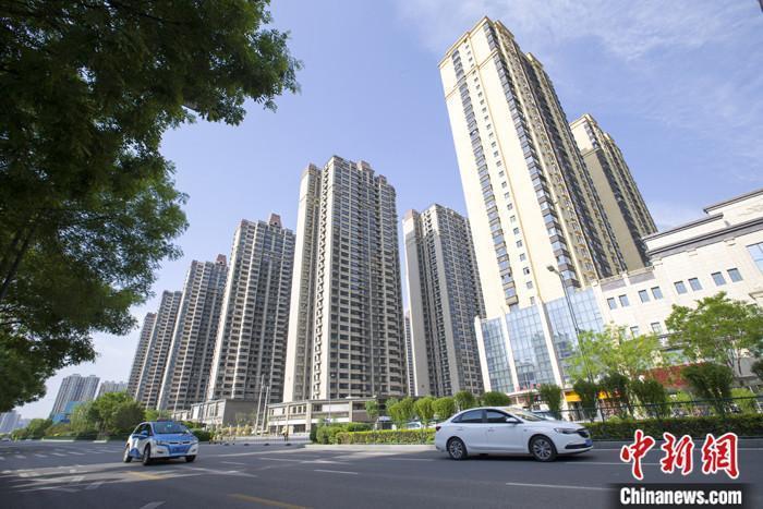 資料圖：車輛從一樓盤前經過。 <a target='_blank' href='/'><p  align=