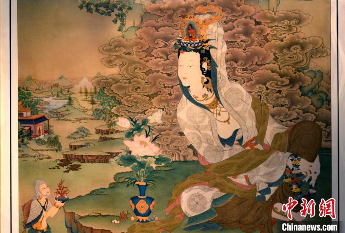 圖為5月16日，展覽中新創唐卡作品《靜息觀音》(局部)?！±盍?攝